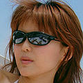 Beautiful japanese beauty in bikini on the top of the boat