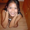 Exotic Cutie Kat gets frisky playing and posing on her bed